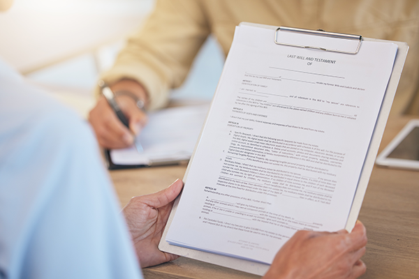 Picture of people looking at a will